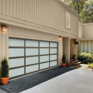 beige home with garage door