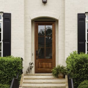 single glass door with wooden frame